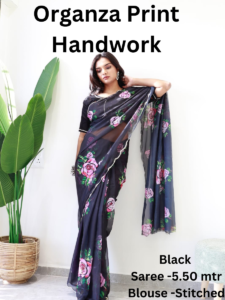 Black organza saree with handwork detailing.